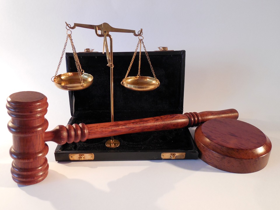 Wooden hammer and a small weighing scale