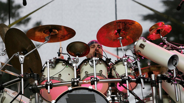 Man playing on drums